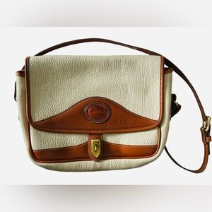 Dooney and Bourke pebbled leather shoulder bag cream brown